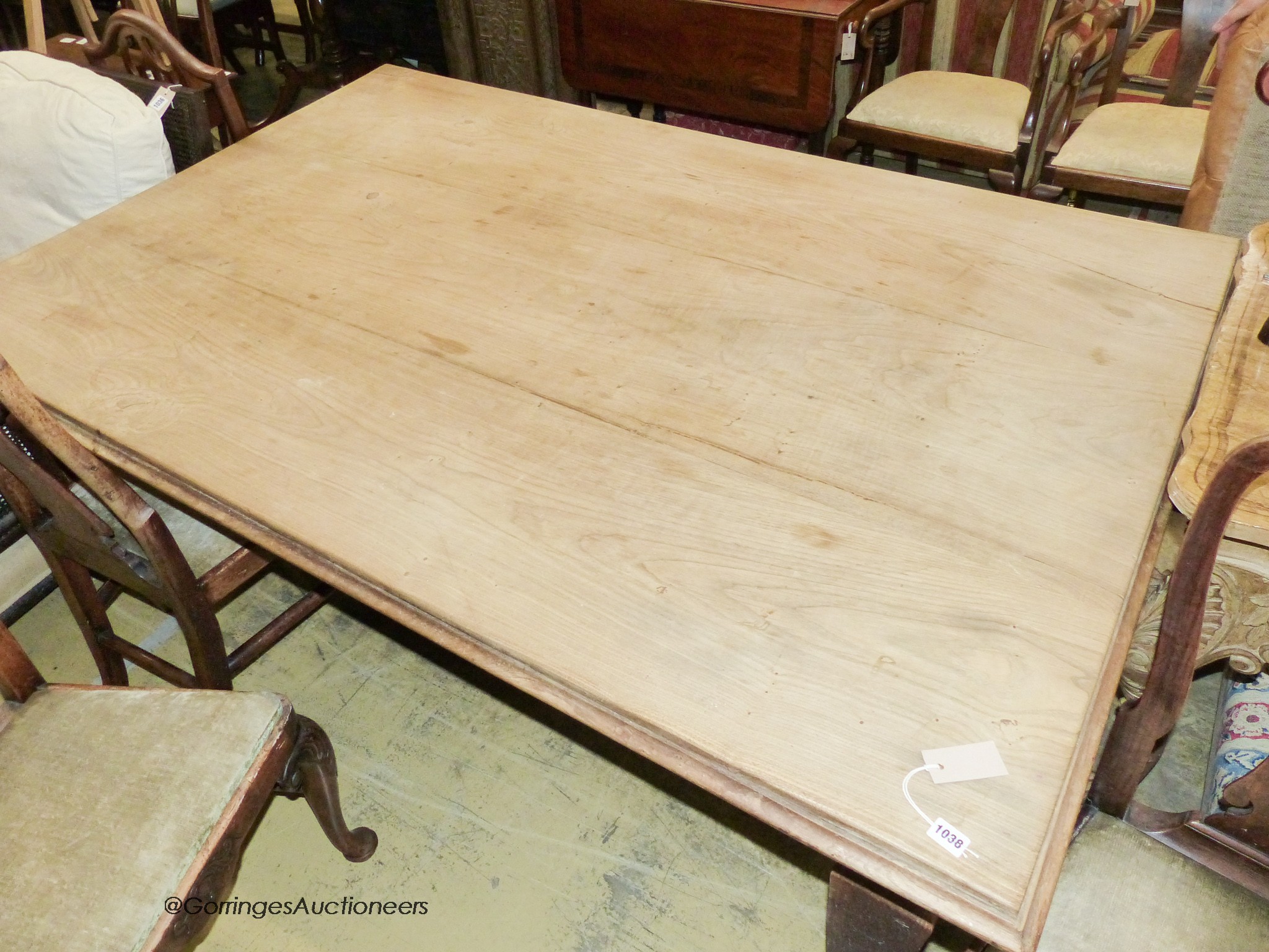 An Arts & Crafts pine rectangular kitchen table, 184cm x 120cm H.76cm